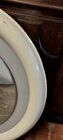 1970s mirror with integrated lighting, futuristic design, vintage wood.