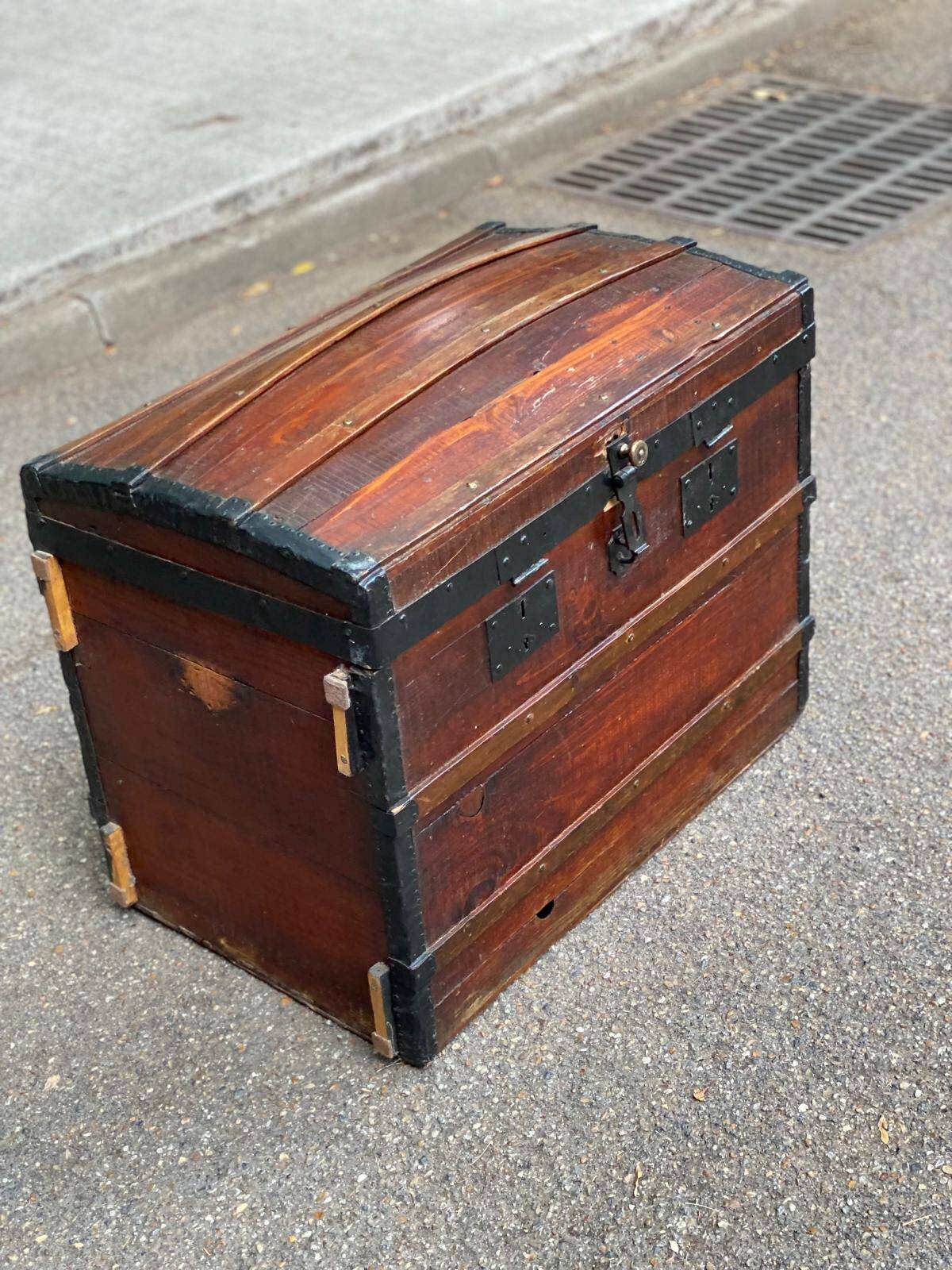 Vintage domed travel trunk from the 19th century.
