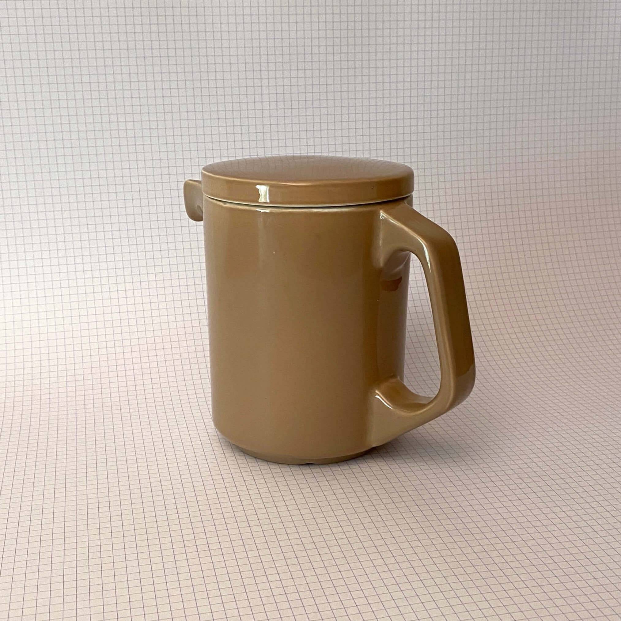Brown ceramic pitcher