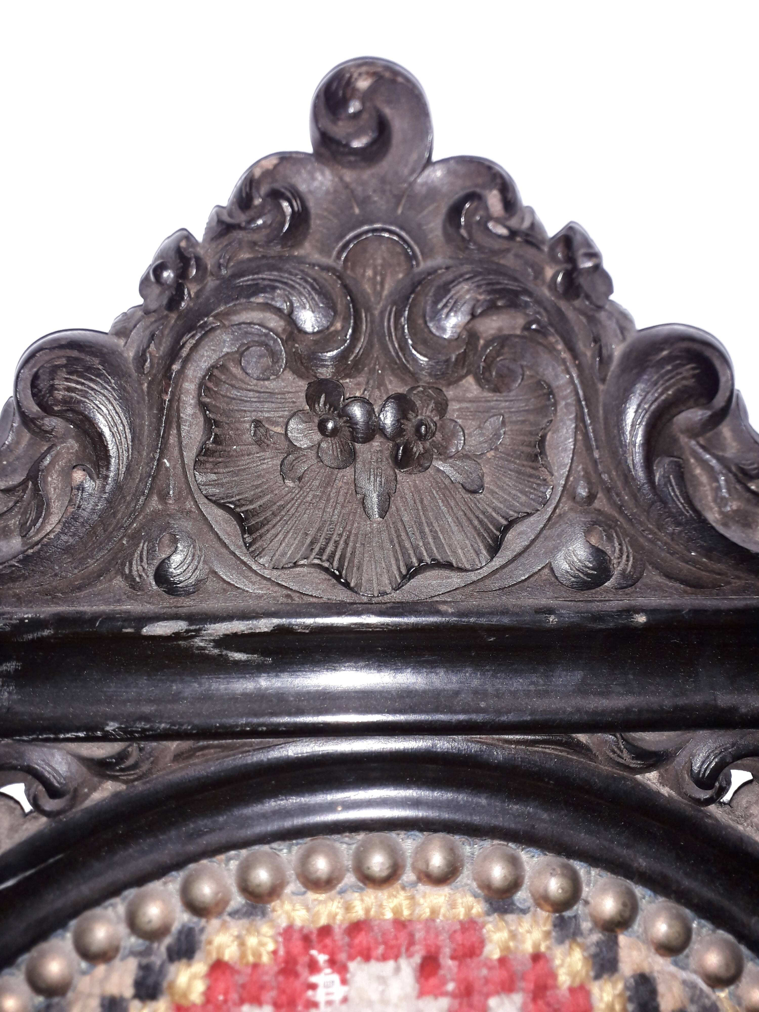 Blackened wooden chair