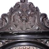 Blackened wooden chair