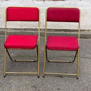 2 folding opera chairs Lafuma France 1970 in gold and burgundy.
