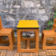 Children's wooden and formica desk and sled chairs 1970