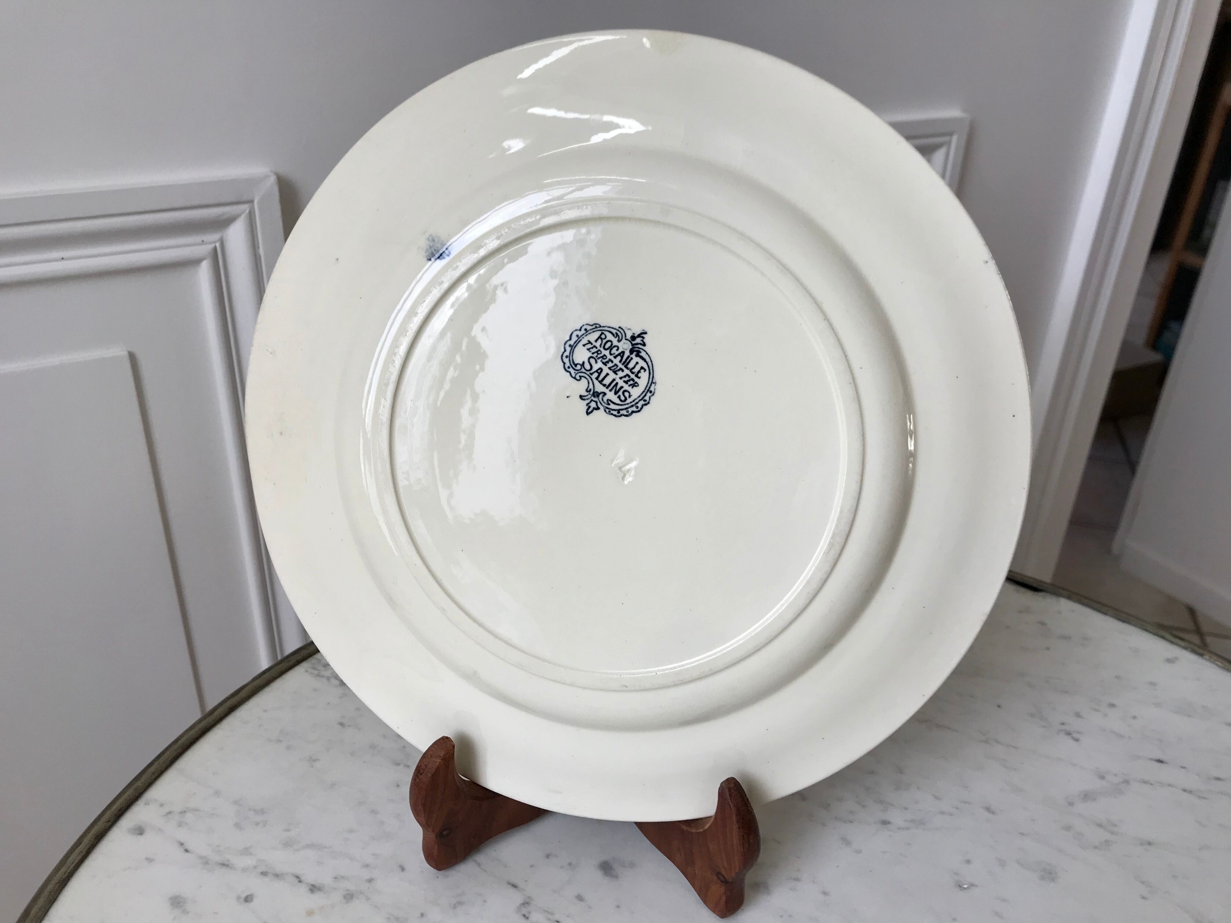 Round plate Iron Earth Salins model "Rocailles" late nineteenth