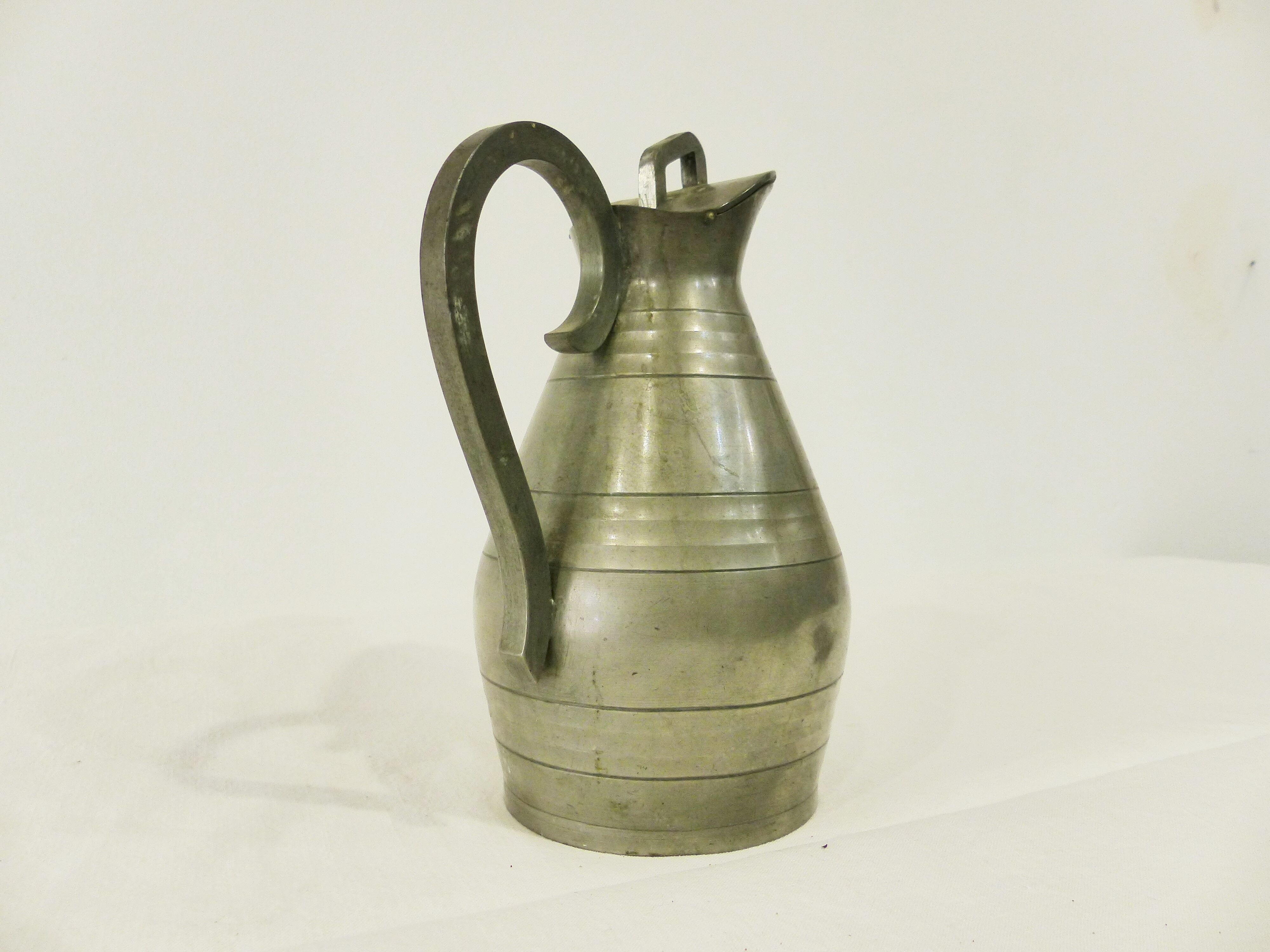 Tin pitcher by J.Despres 20th century