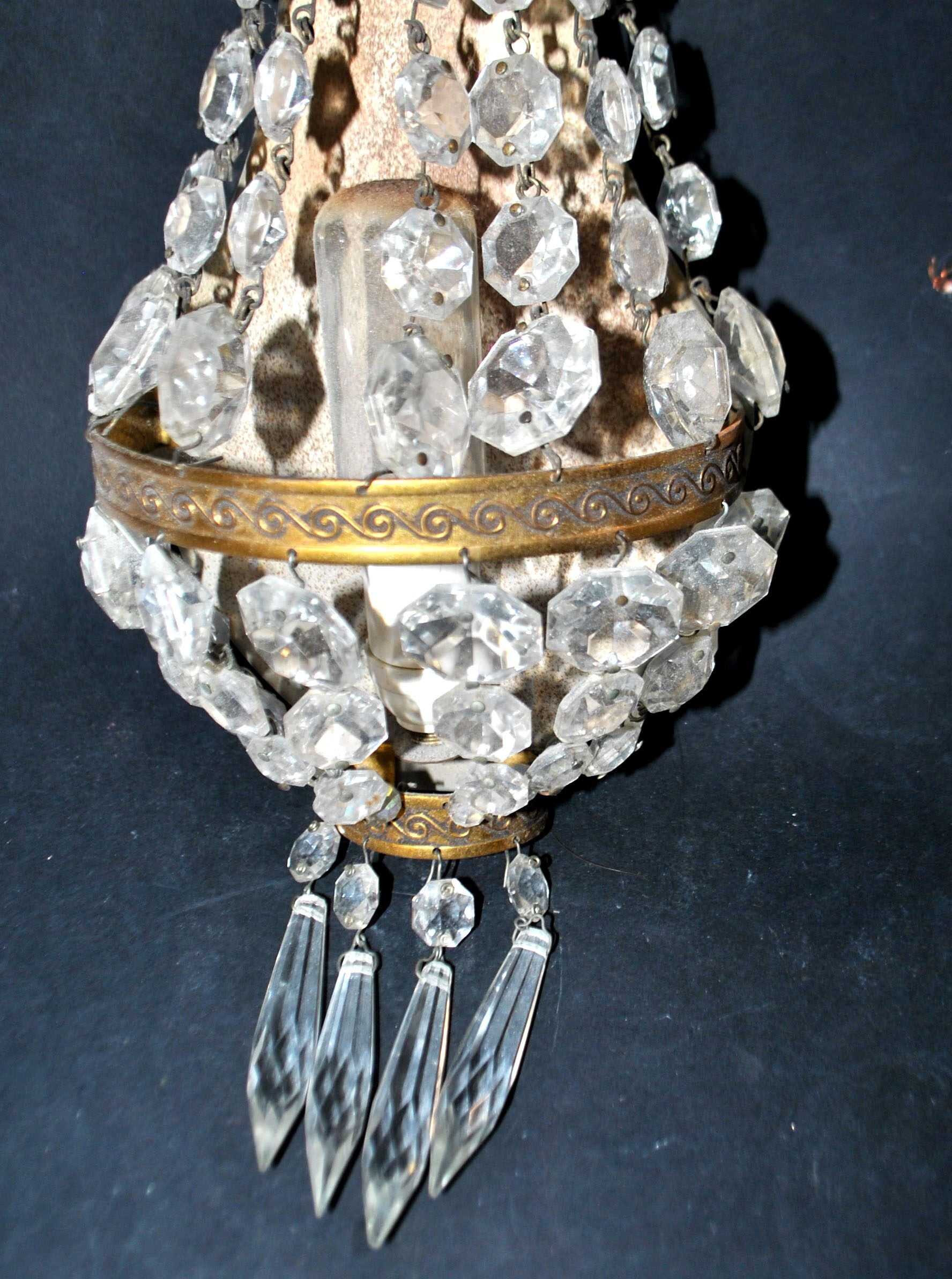 Pair of vintage lamps: wall lights with gold trim and cut crystal.