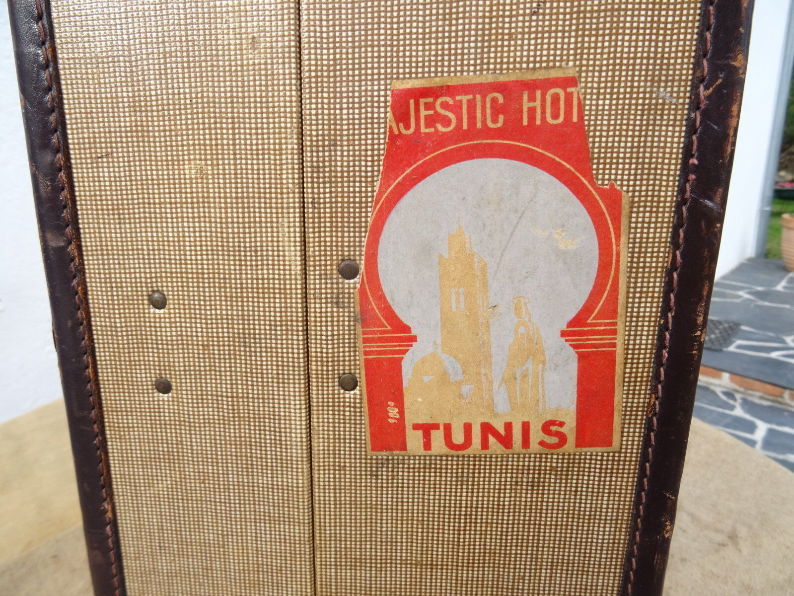 1930s Oshkosh suitcase with bakelite hangers