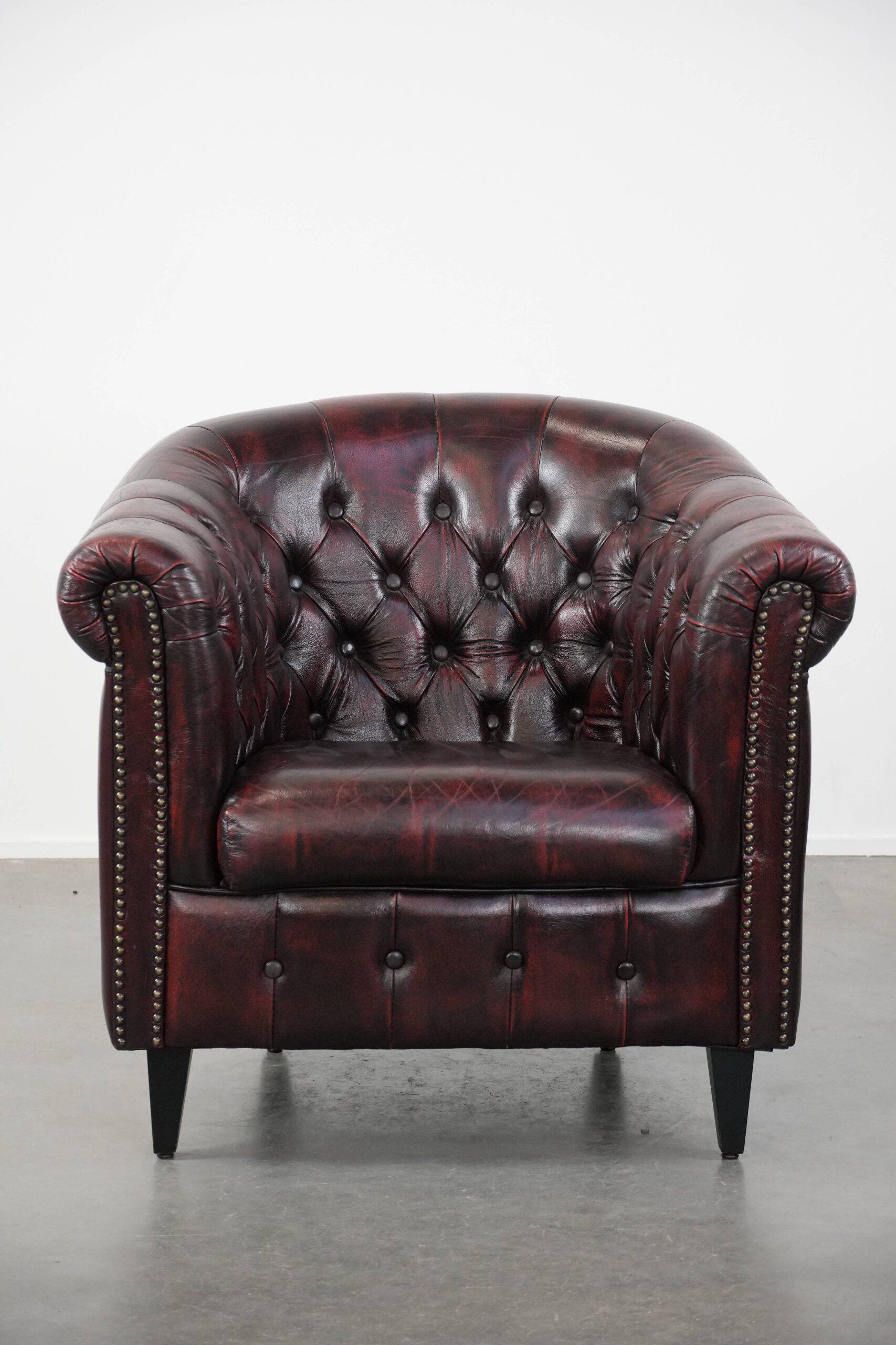 Cow leather Chesterfield club armchair in classic English style