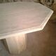 Octagonal table in travertine, 80s