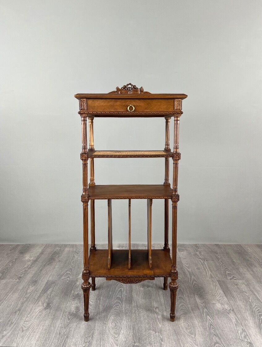 Louis XVI style music cabinet in carved wood with caning, 19th century.