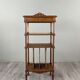 Louis XVI style music cabinet in carved wood with caning, 19th century.