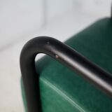 Pair of armrest heaters. Steel and green imitation leather. France, circa 1980