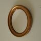 Small vintage oval mirror in gilded resin from the 60s/70s.