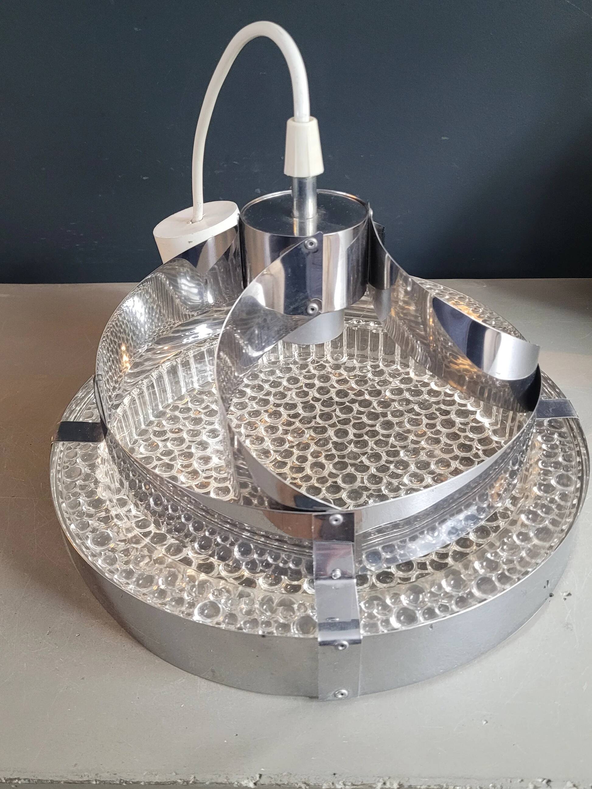 Suspension space-age in plastic bubble and aluminium