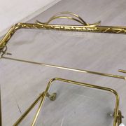 Vintage golden brass rolling service