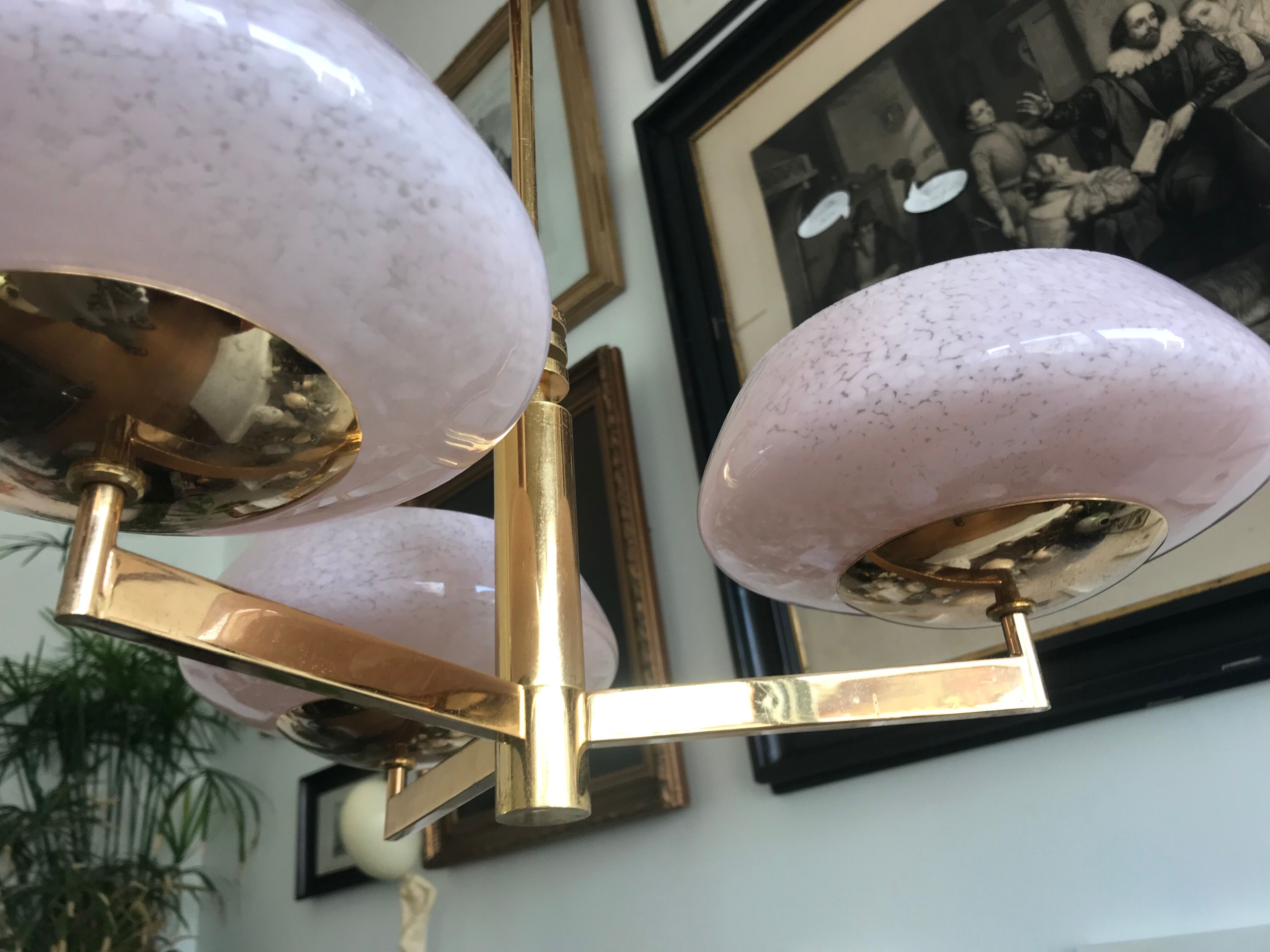 Golden chandelier by Maison Sciolari