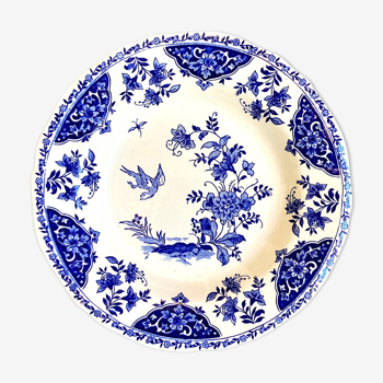 Round and hollow gien dish in white and blue enamelled earthenware