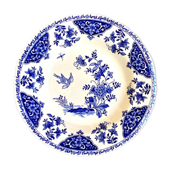 Round and hollow gien dish in white and blue enamelled earthenware