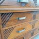 Art Deco commode with marble top, vintage antique furniture.