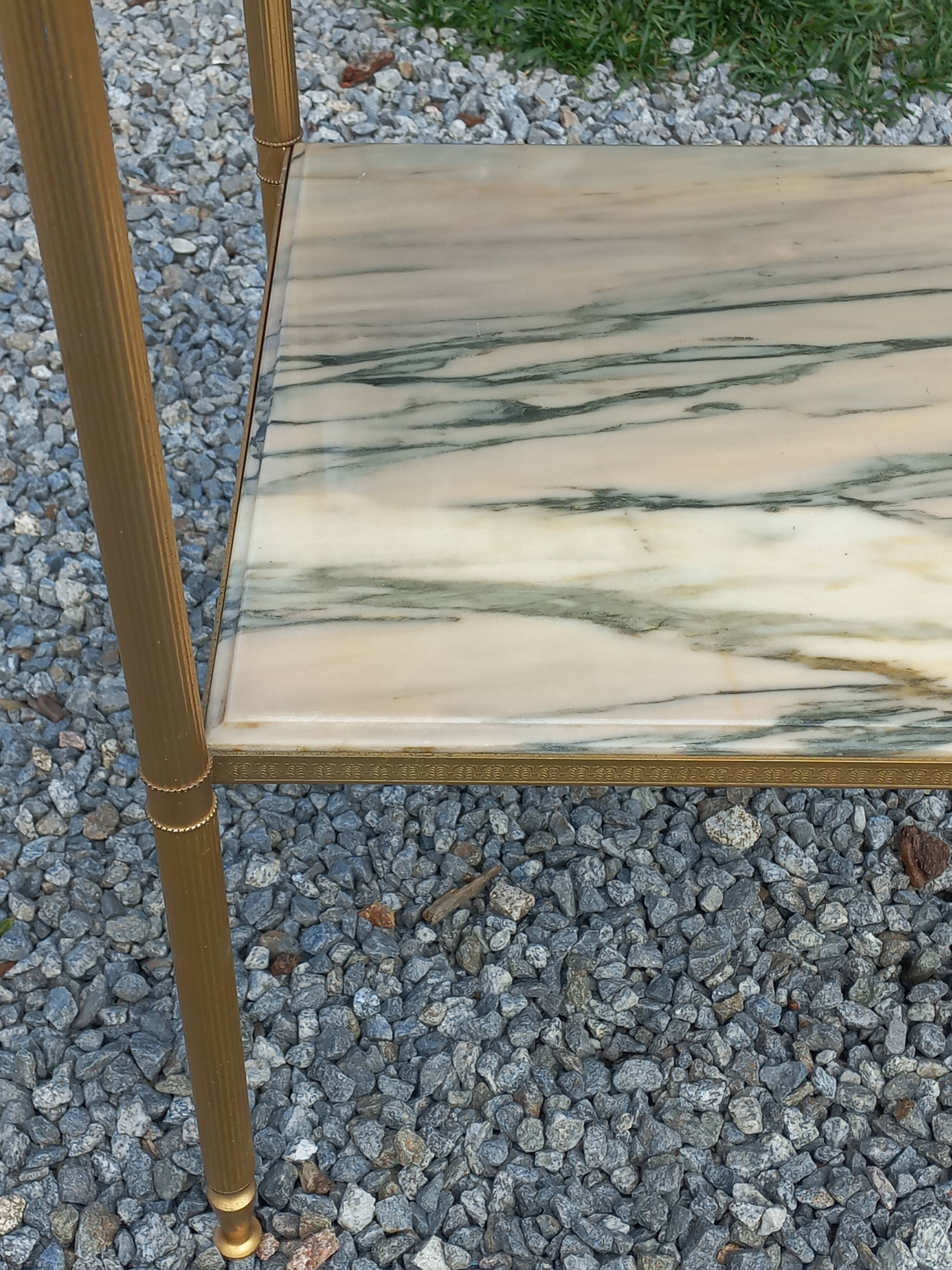 Pair of neoclassical side tables in bronze, brass, marble, and o.