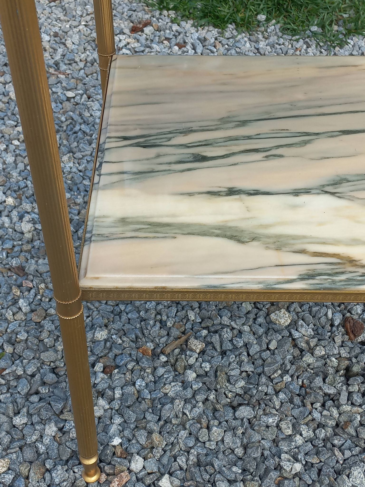 Pair of neoclassical side tables in bronze, brass, marble, and o.