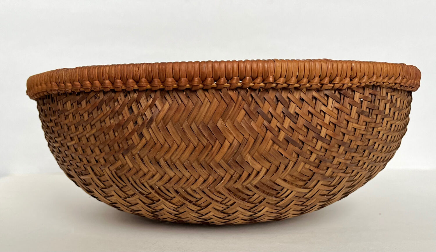 Woven straw basket