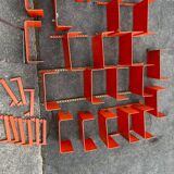Large modular bookcase shelf in orange thermoformed wood circa 1970