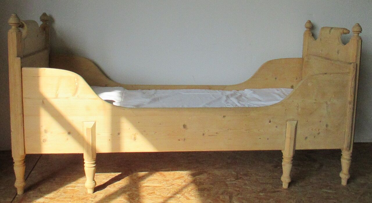 Retractable sofa bed of the Austrian Tyrole in natural wood
