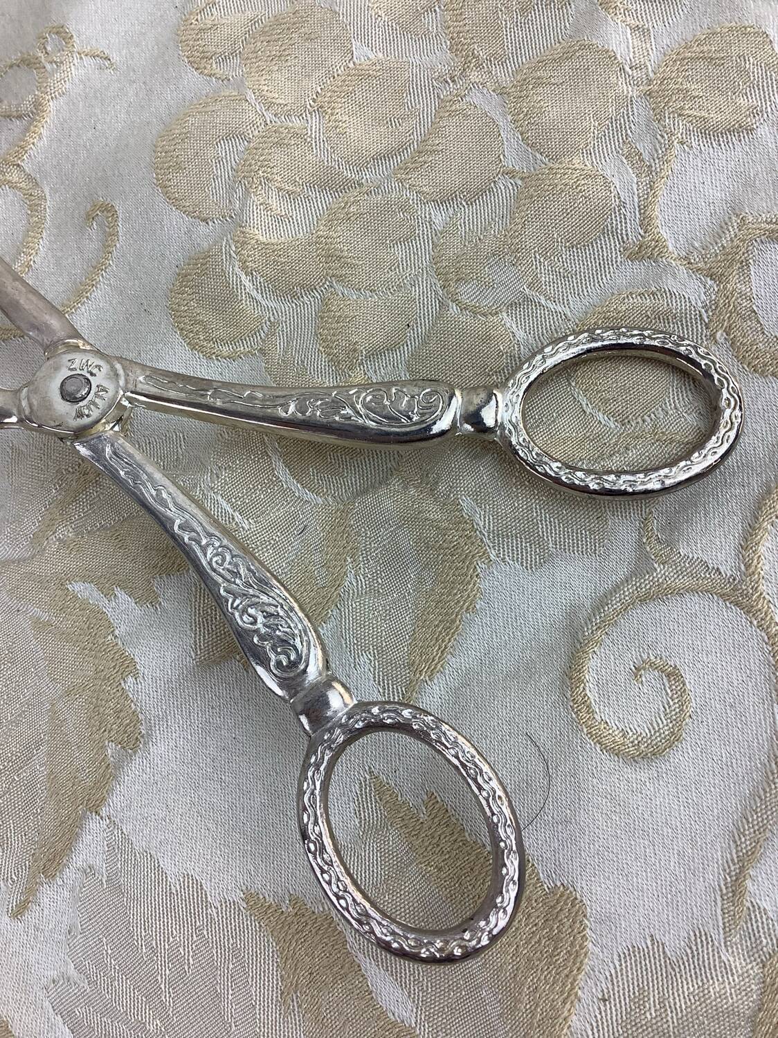 Old cutlery tongs