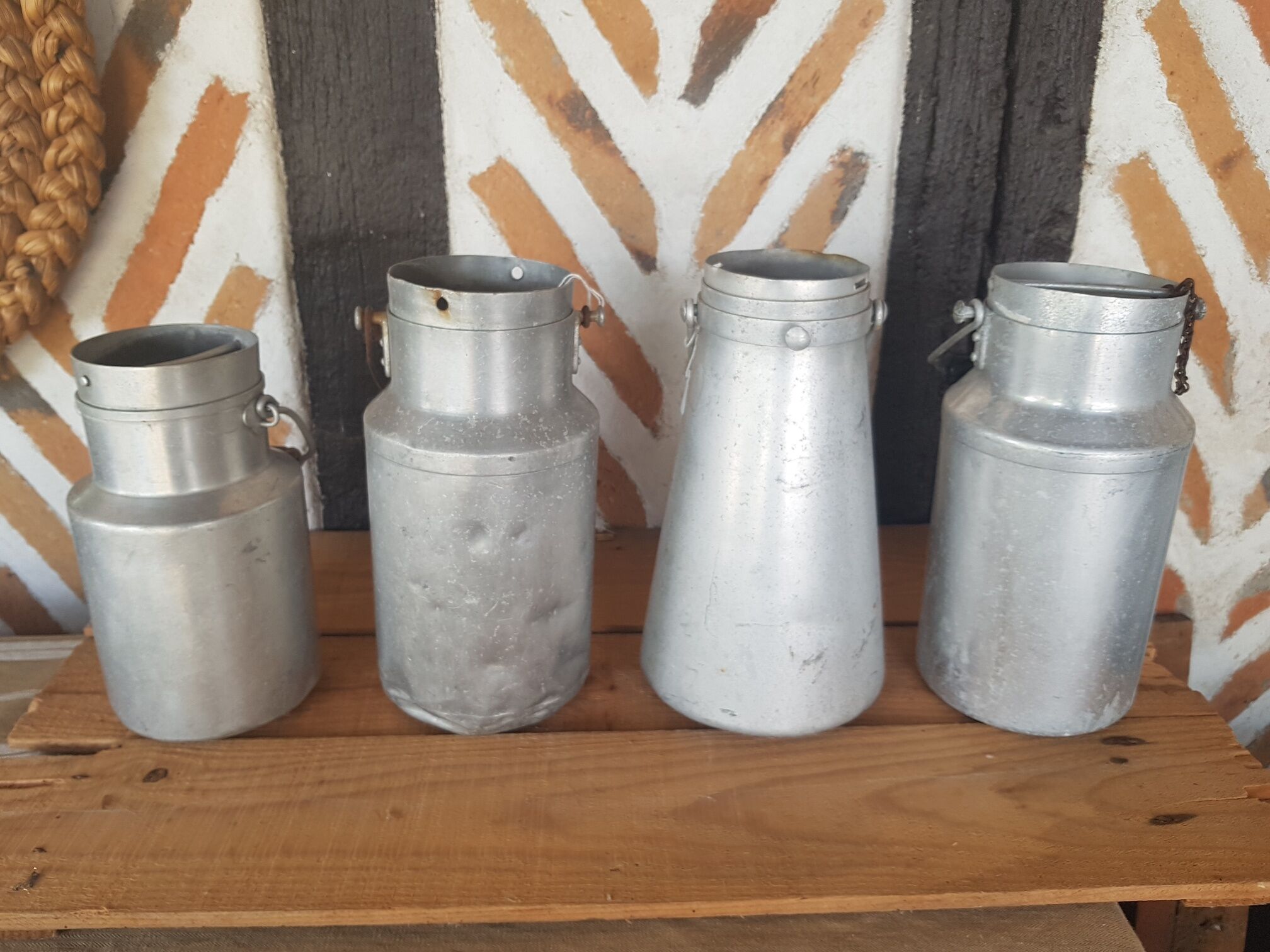 Set of 4 old metal milk canister jars