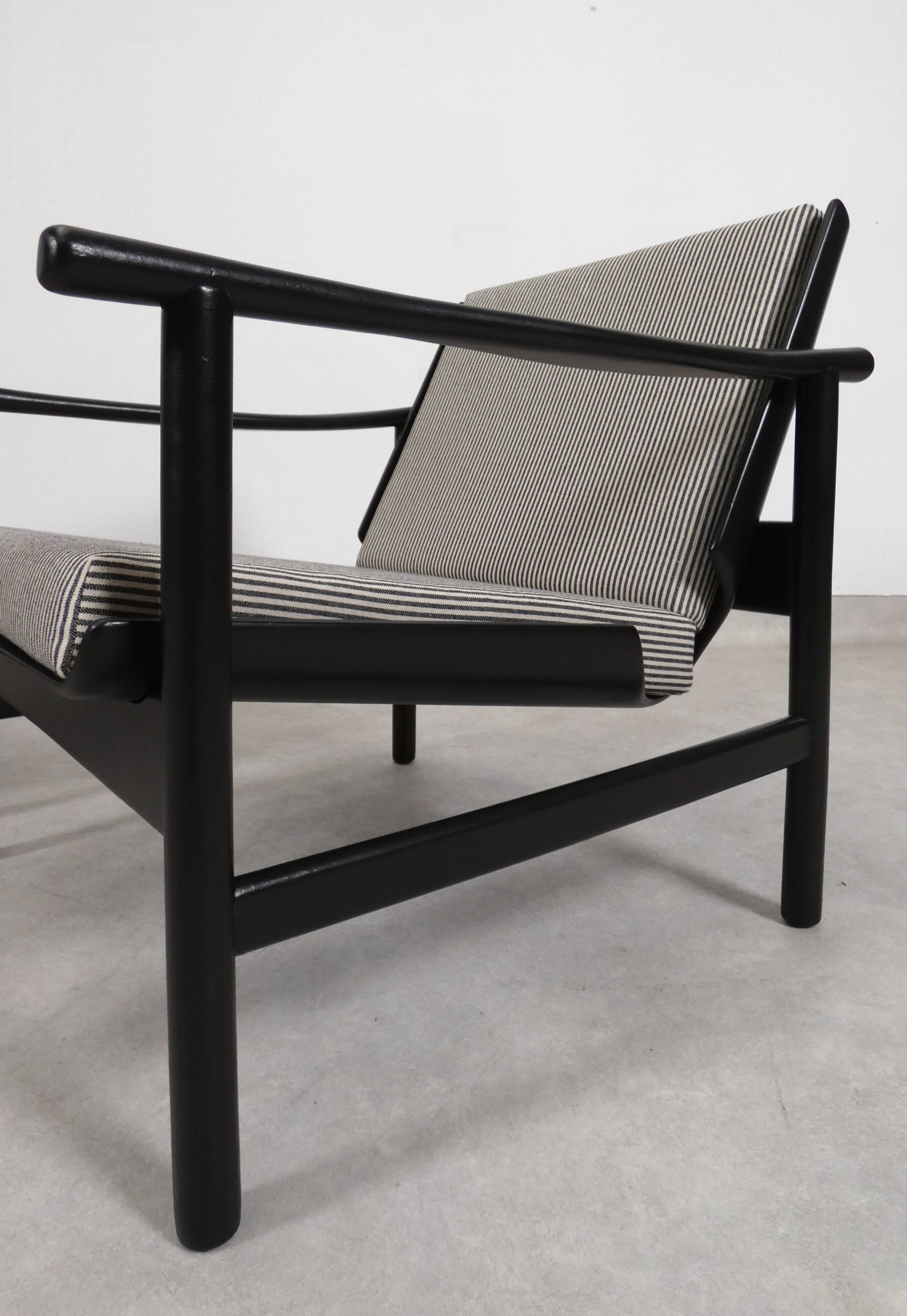 2x wooden Scandinavian arm chairs