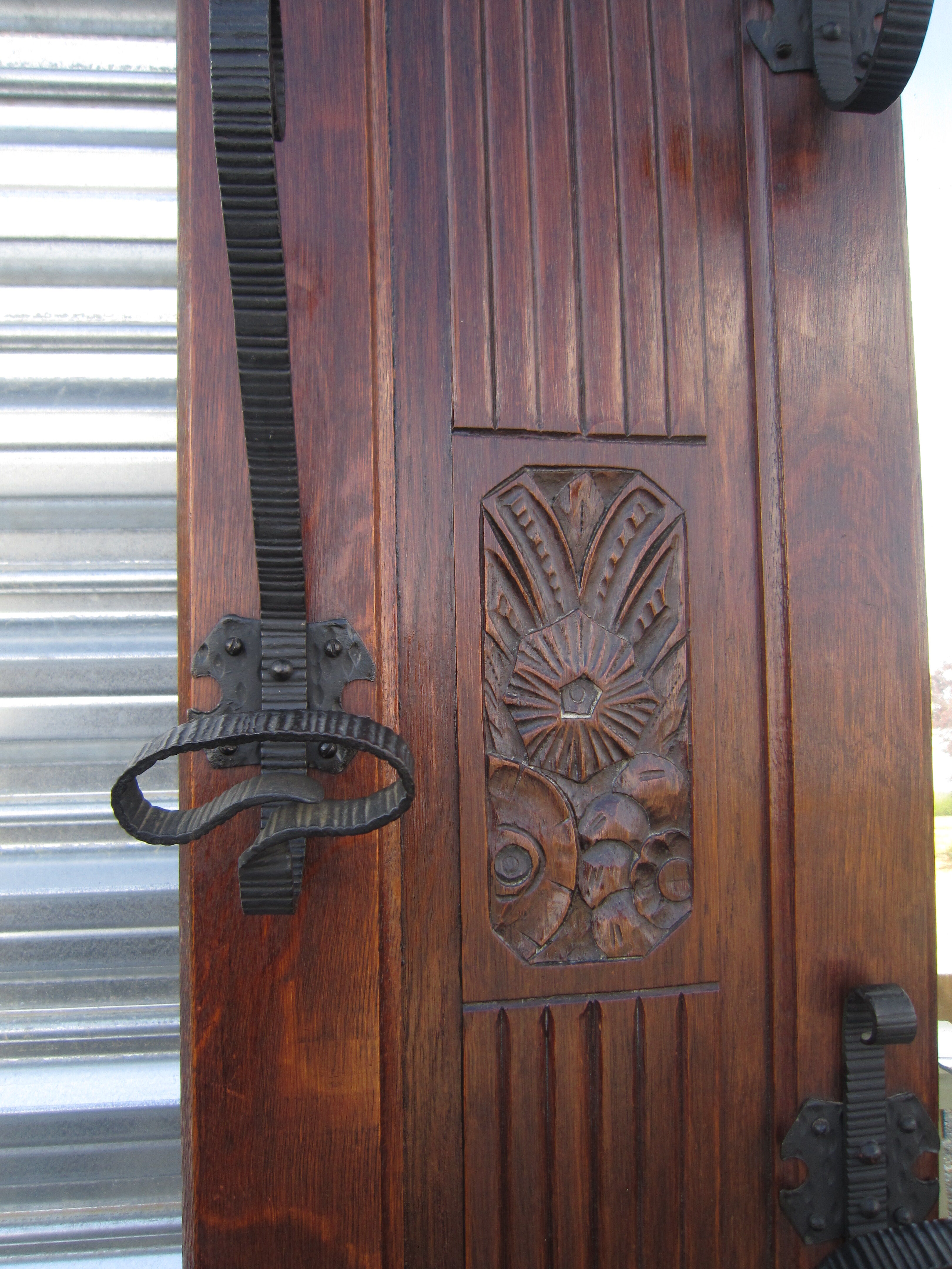 Vestiaire wears hat coat and art deco umbrella in wrought iron patere wood