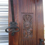 Vestiaire wears hat coat and art deco umbrella in wrought iron patere wood