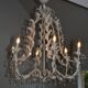 Large cage chandelier in aged metal.