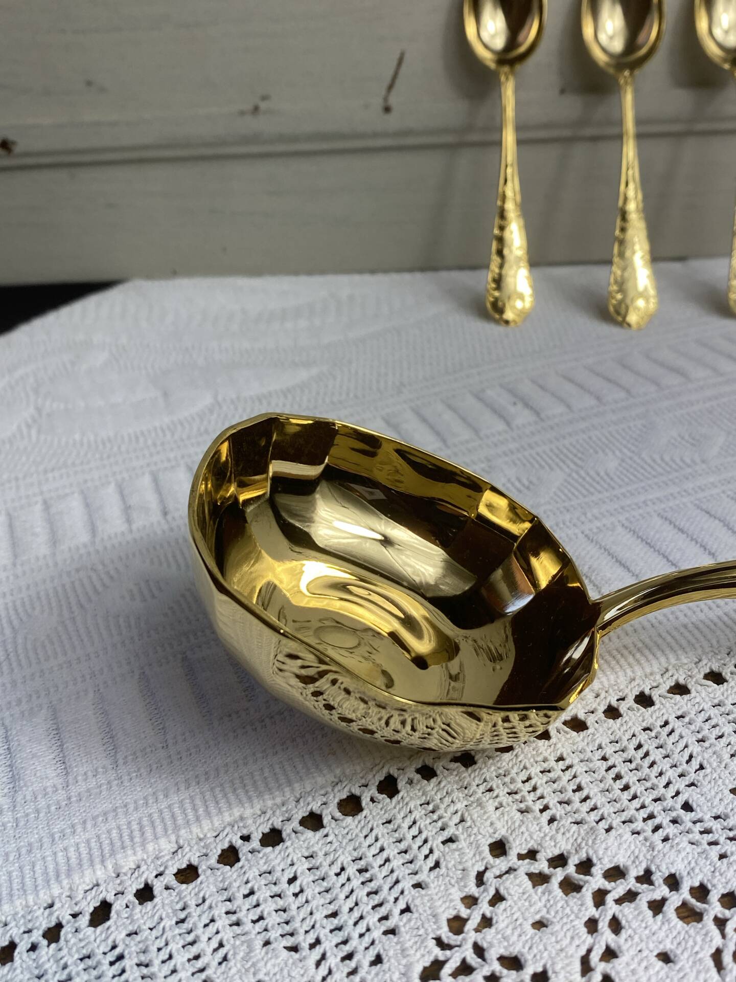 Dessert spoons and serving ladle
