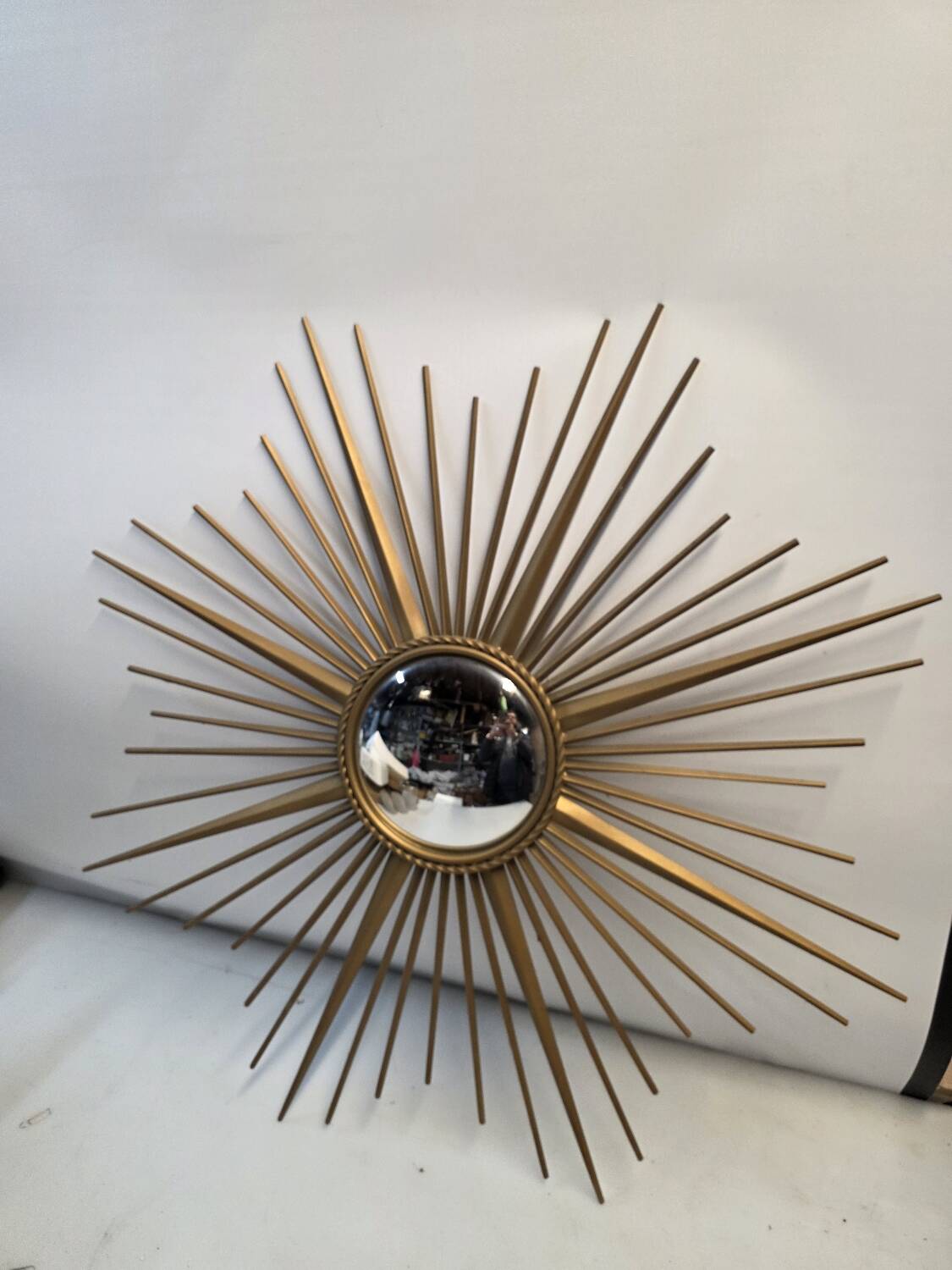 Golden metal witch's eye sun mirror from the 70s, 86cm.