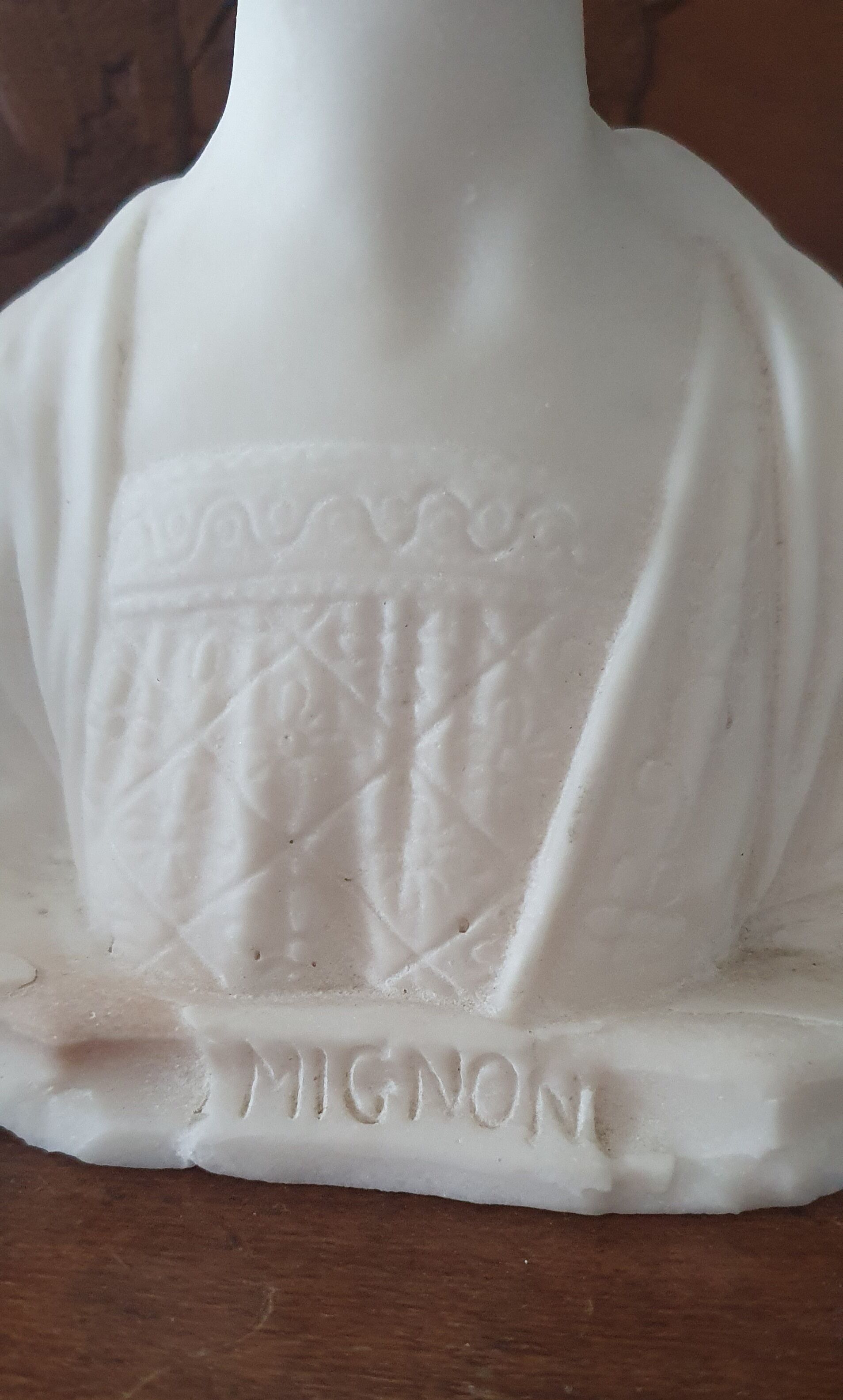 Bust of young woman L.Mignon