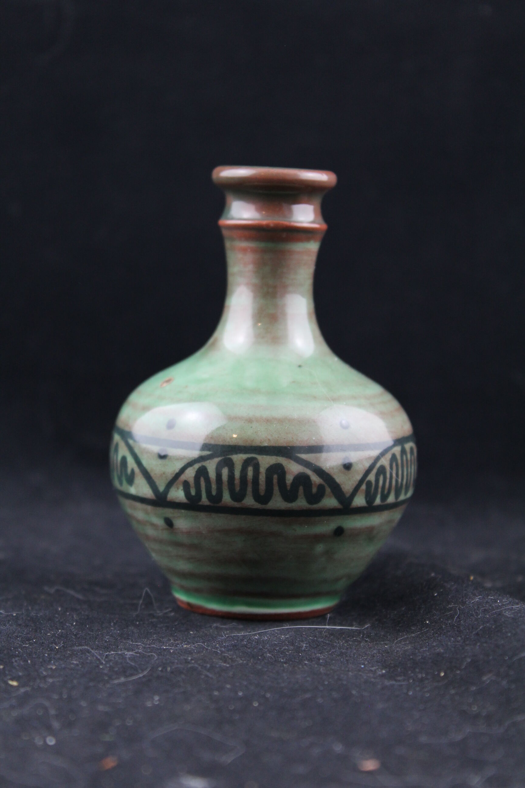 Single-stem vase signed "K" in ceramic