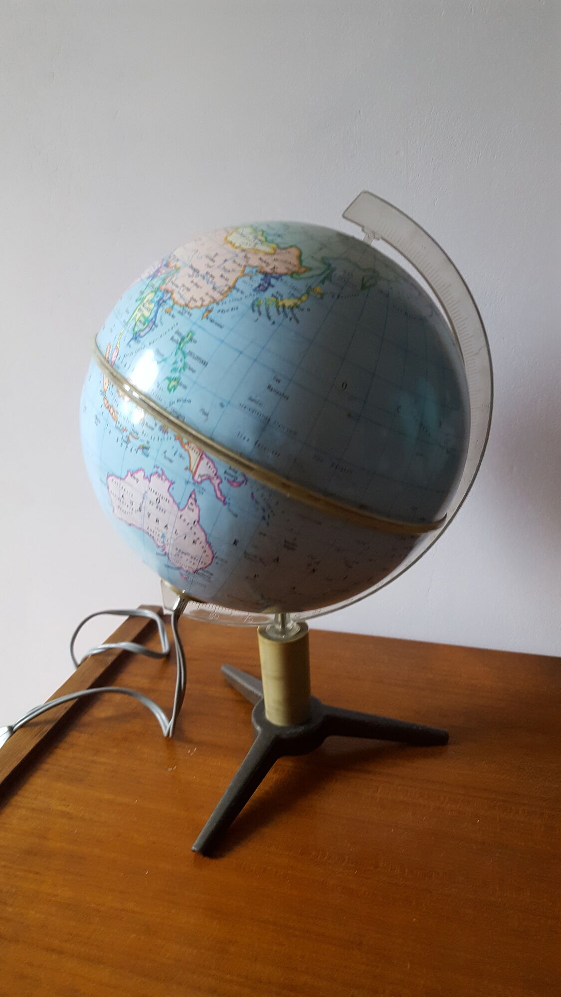 Bright vintage Earth globe brand Vulliermes with metal tripod foot