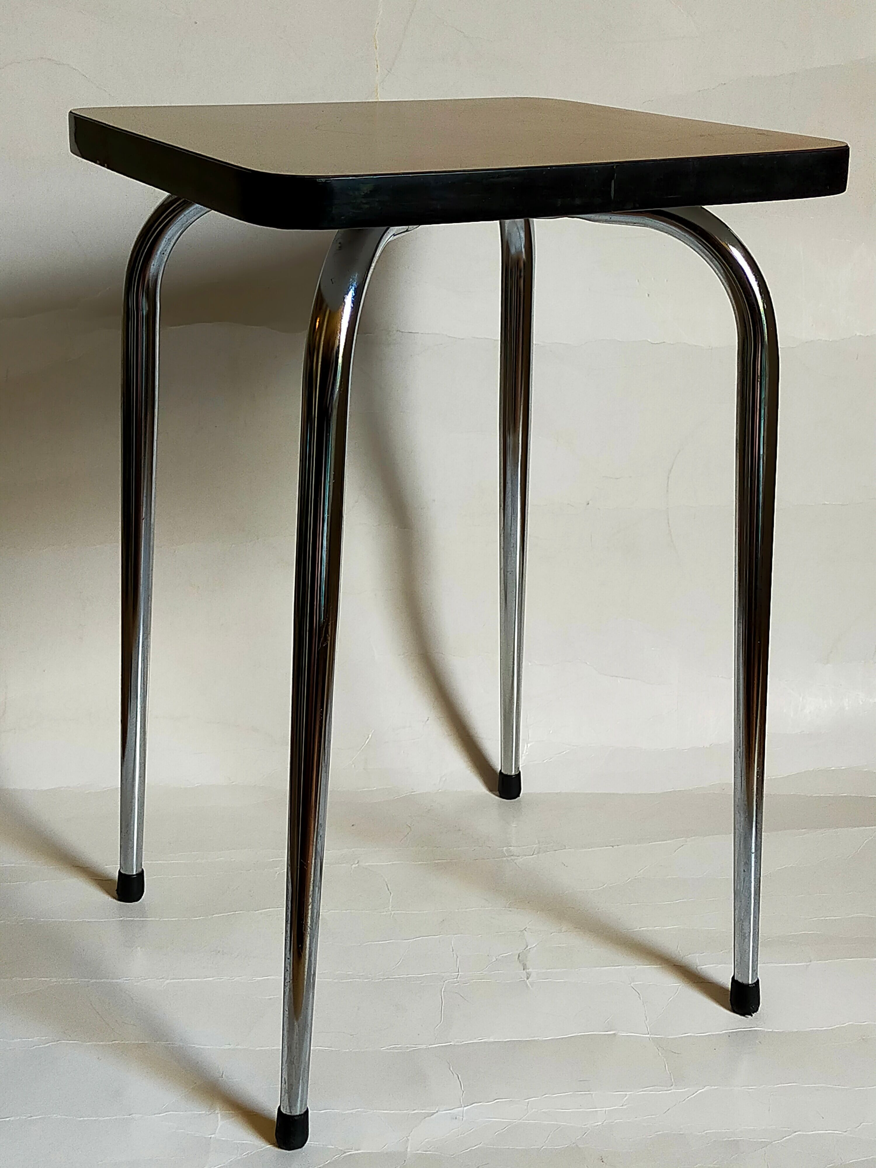 Vintage formica stool with tapered feet