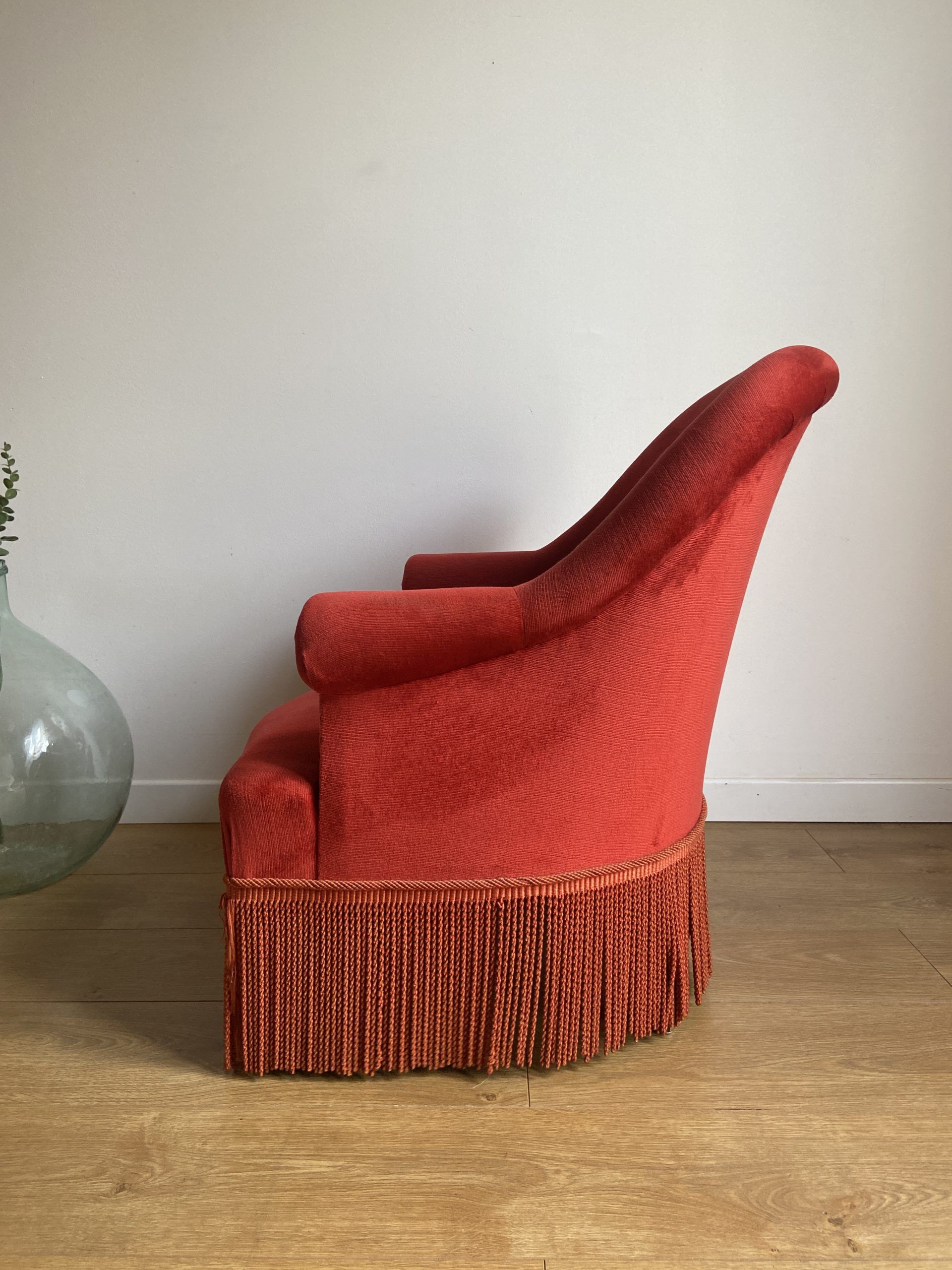 Vintage toad armchair with brick red velvet fringes