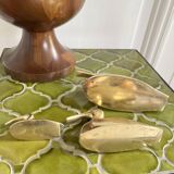 Three brass ducks from the 1950s