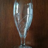 Eight champagne flutes in engraved glass
