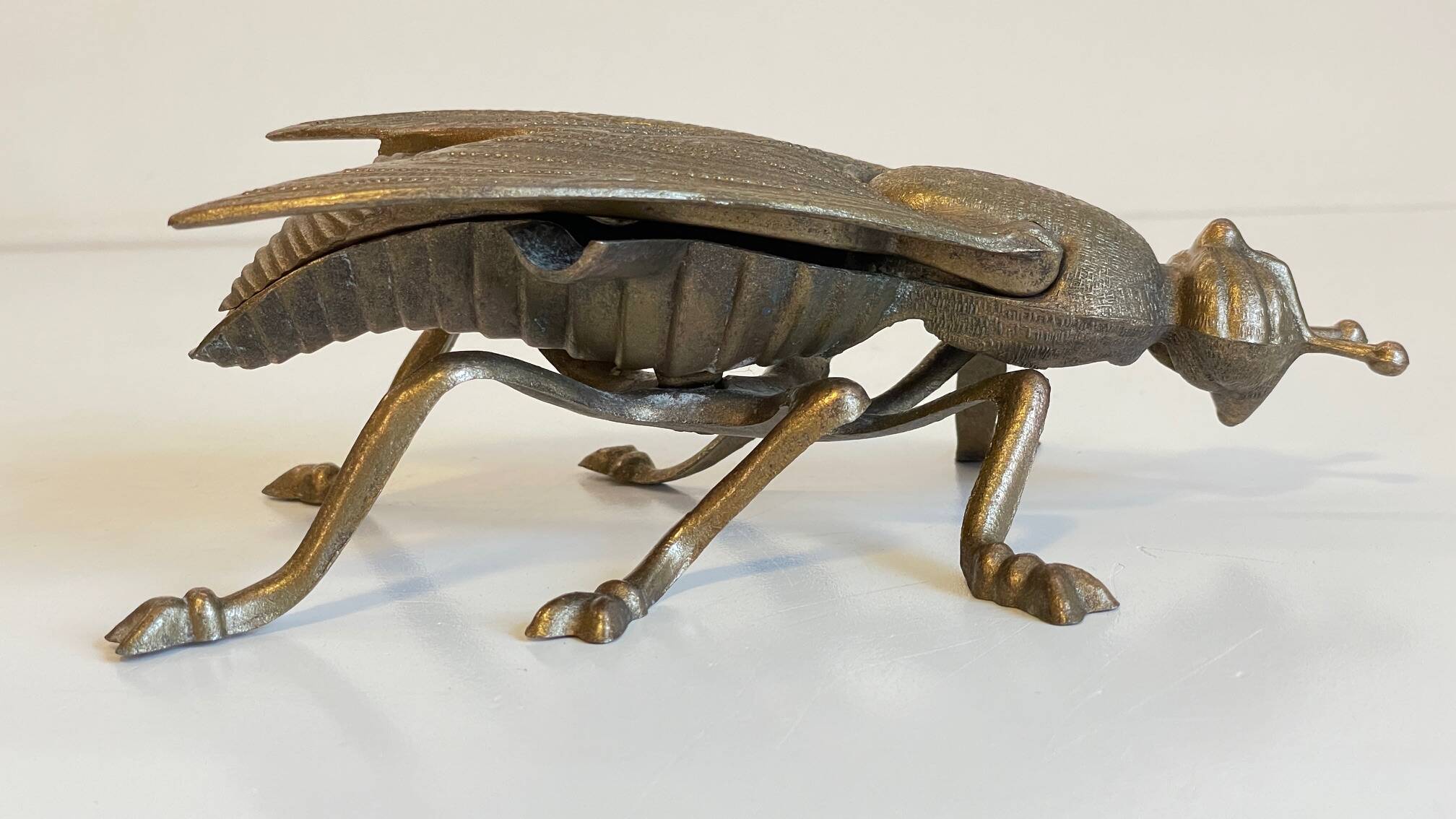 Vintage fly ashtray in patinated metal