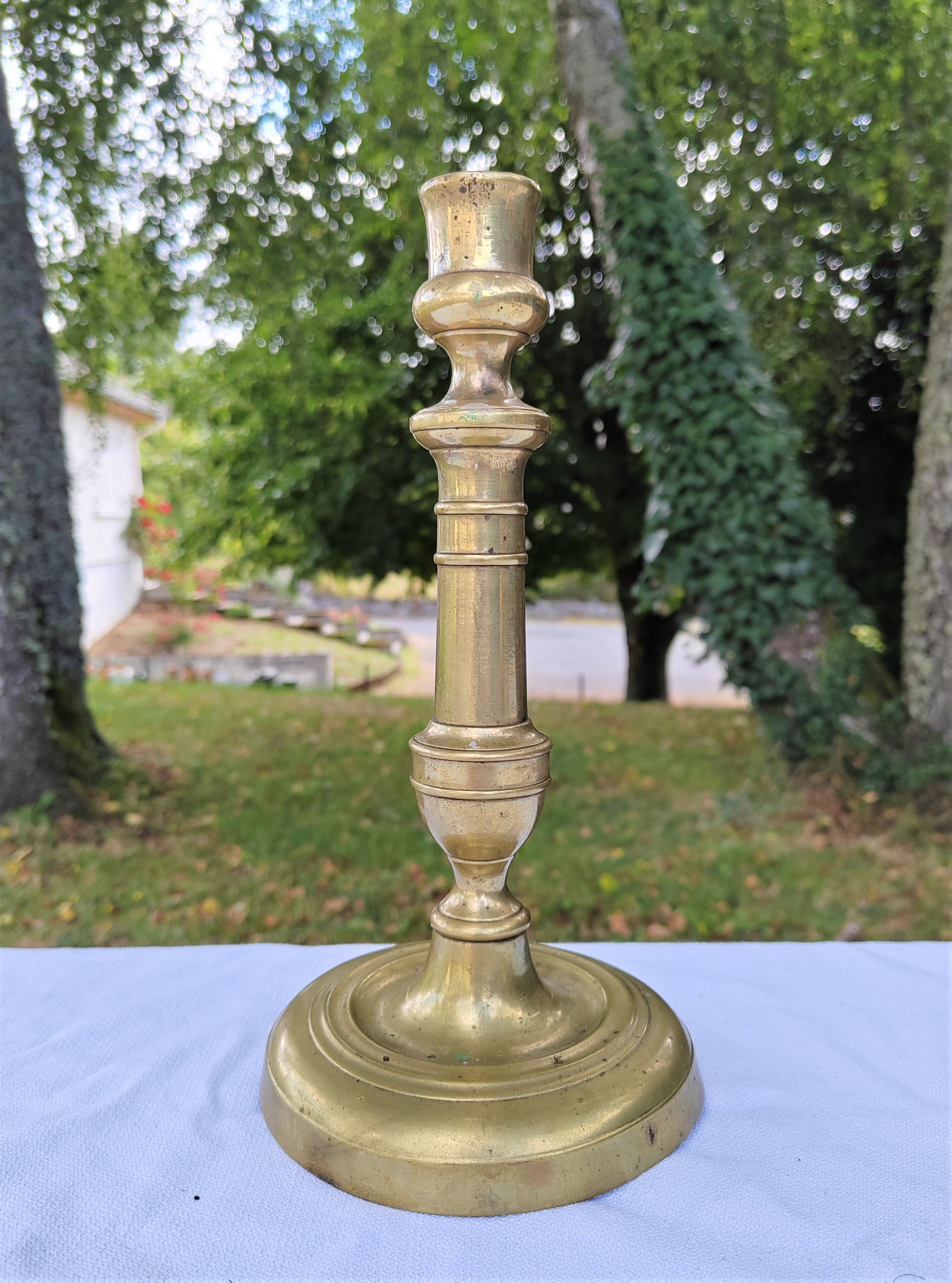 Golden brass candle holder