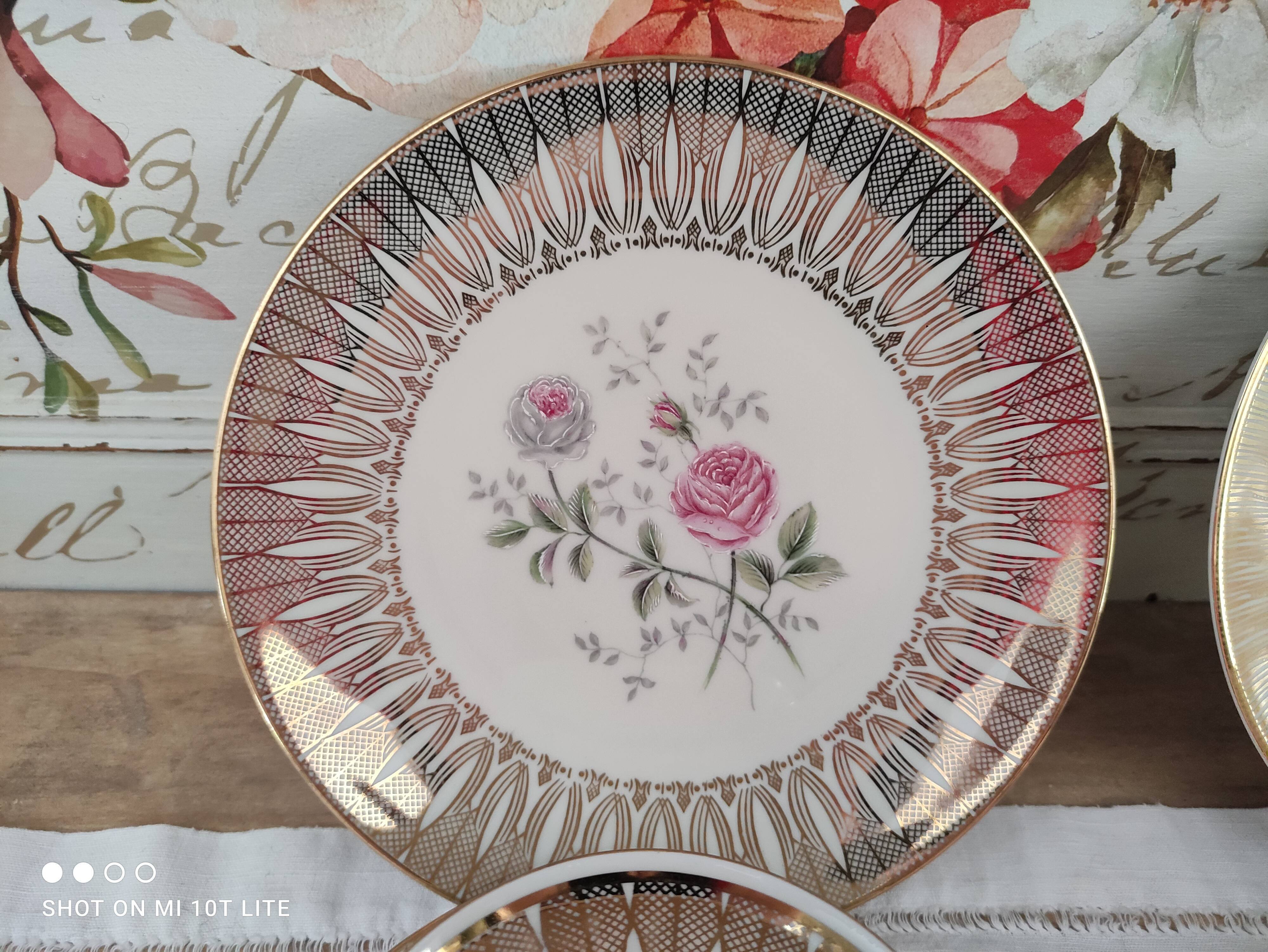 Head to head in porcelain Bavaria 6 pieces floral decoration and gilding