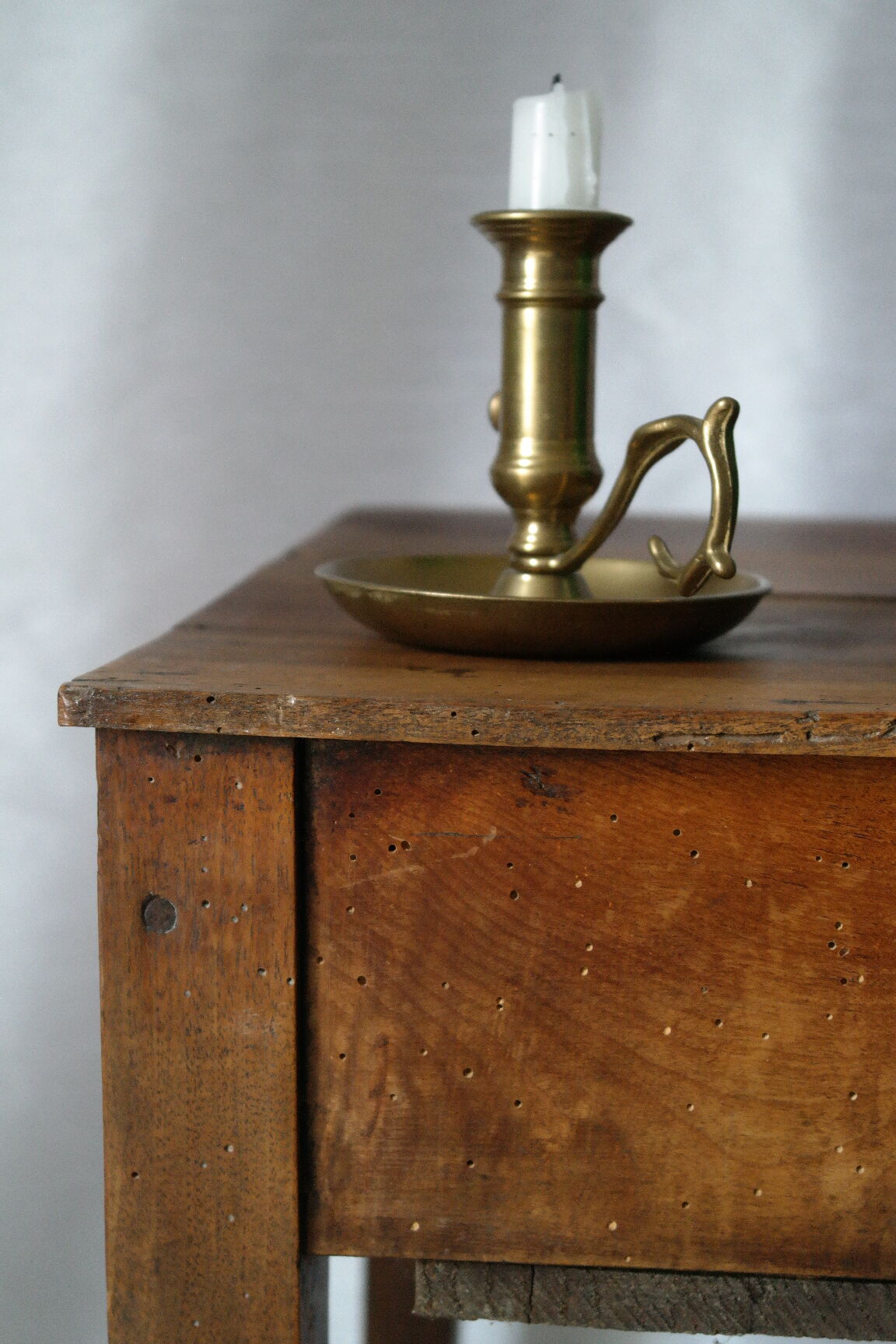 Antique country-style walnut side table