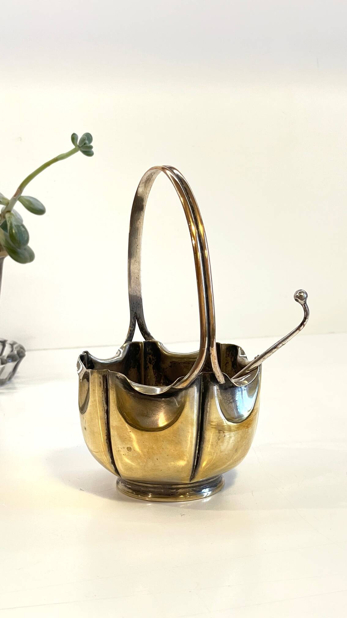silver metal sugar bowl with gold patina
