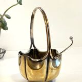 silver metal sugar bowl with gold patina