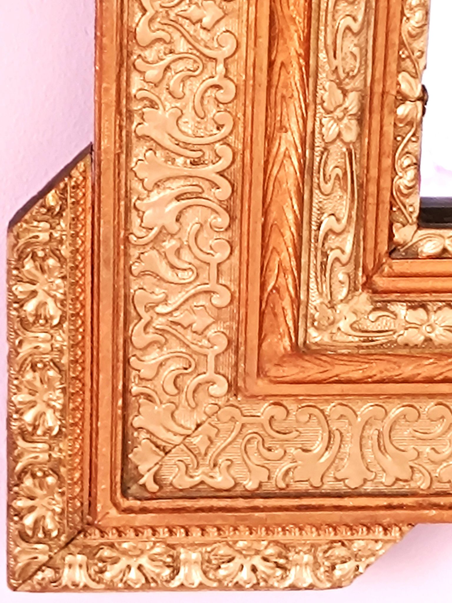 Napoleon III mirror with rich gilded ornamentation